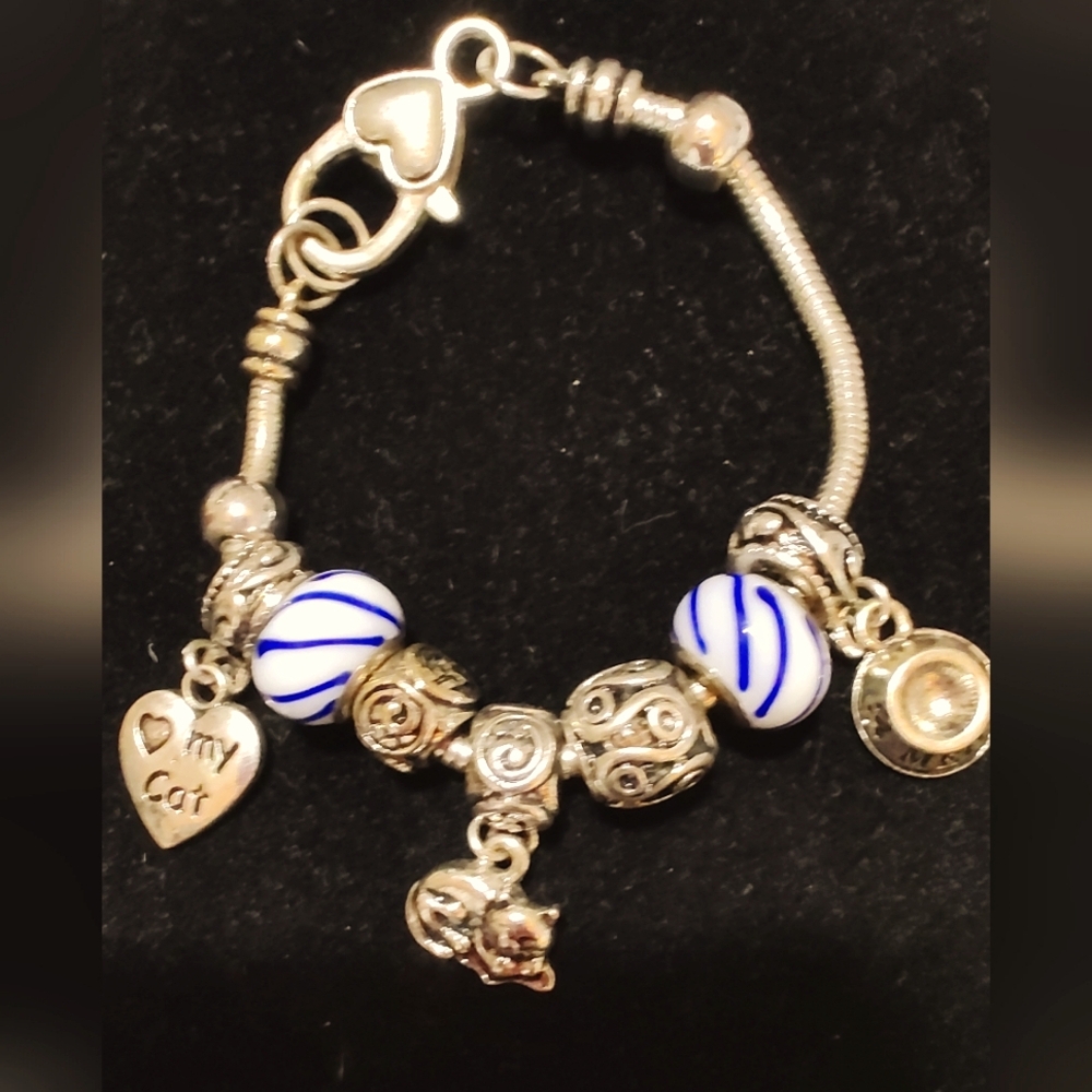 Charm Bracelet, Cats